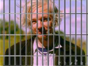 Julian Assange behind bars
