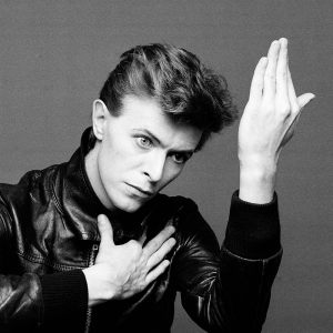David Bowie, seen here trying (and failing) to give the Hailing Sign of a Fellowcraft Freemason ("Heroes," 1978)
